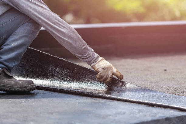 Professional Emergency Waterproofing technician working in Holtsville, NY